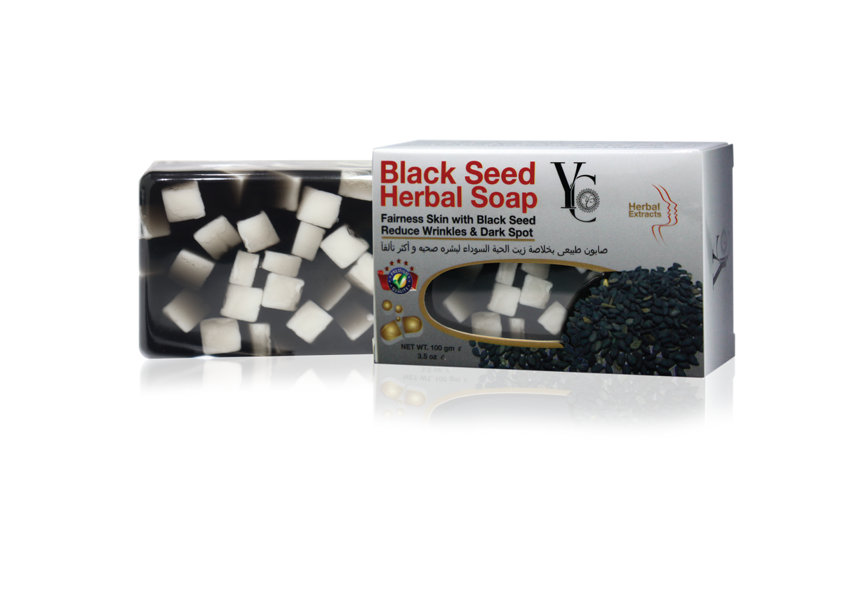 Black Seed Herbal Soap by Vital Cosmetics, shown with its retail box and a clear window displaying the white and black soap cubes inside, set against a plain white background with a soft reflection.