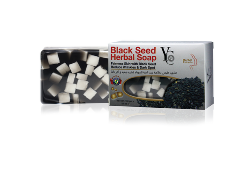 Black Seed Herbal Soap by Vital Cosmetics, shown with its retail box and a clear window displaying the white and black soap cubes inside, set against a plain white background with a soft reflection.